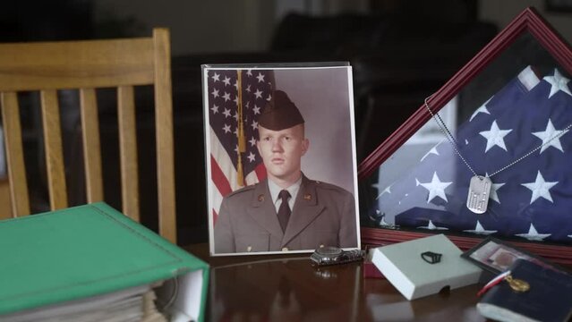 Memorabilia from Army serviceman lost in battle - sliding close up