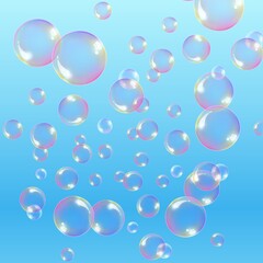 Soap bubbles in the air with blue gradation background