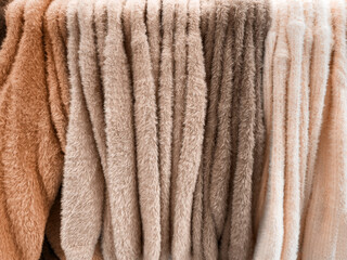 Color Knitting wool texture background. New trending PANTONE Peach Fuzz colour of 2024 year