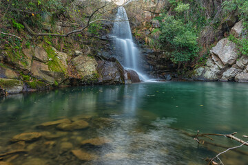 Fototapeta na wymiar Gran Capitan waterfall and lagoon on the Miel River in Algeciras - Cadiz.