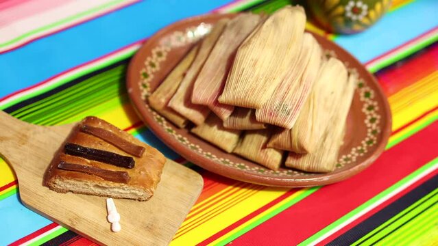 plate full of tamales and rosca de reyes. Traditional mexican food