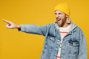 Young sad mad outraged furious blond man he wearing denim shirt hoody beanie hat casual clothes...