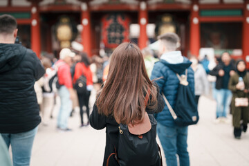 Tourist woman visit Sensoji Temple or Asakusa Kannon Temple is a Buddhist temple located in...