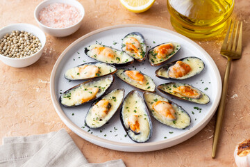 Baked mussels with cheese and herbs. Seafood. Healthy eating.