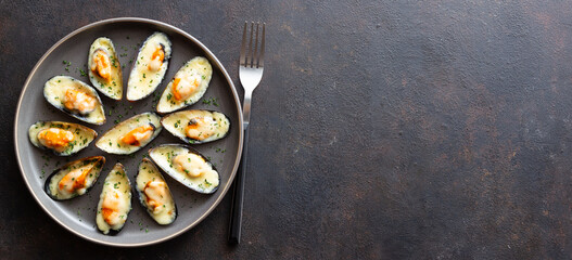 Baked mussels with cheese and herbs. Seafood. Healthy eating.