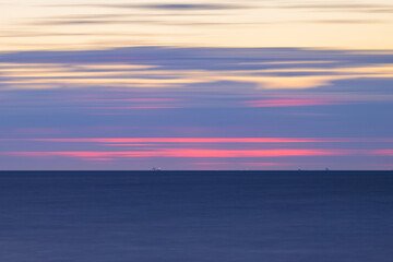 Obraz premium Abstract background of a sunset at the atlantic ocean