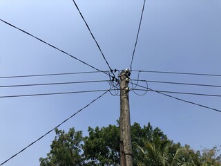An artistic capture of jumbled power lines, symbolizing the energy of urban living.
