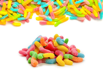 Frame of assorted gummy candies isolated on white. Top view. Space for text or design.