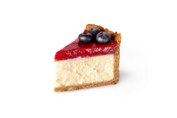 Piece of Classic New York cheesecake with strawberry jam decorated with blueberries close up isolated  on white or transparent png