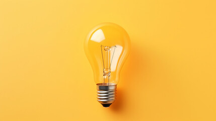 Light bulb on yellow background, top view. Creative idea concept - obrazy, fototapety, plakaty