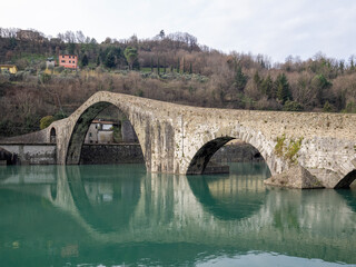 view of the Ponte della Maddalena or Ponte del Diavolo in Borgo a Mozzano Lucca. tuscany Italy