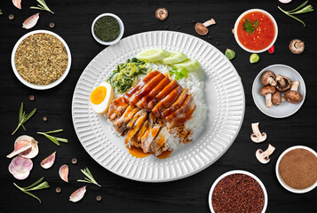 The photo of Thai food with sauce, herb, flavor on the dark wood table background