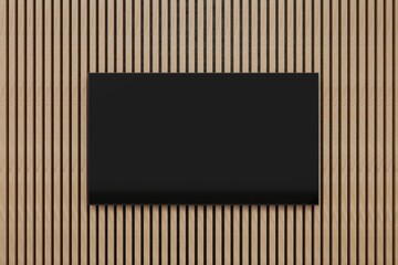 Flat screen TV on acoustic panel covered wall. Clean minimalist interior. Close up shot. Template for TV creative