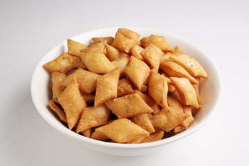 Indian sweet snack made from dough made from flour or rava or semolina, sugar and ghee