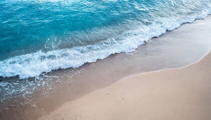 Fototapeta na wymiar Beautiful soft blue ocean waves on a sandy beach in summer. Vacation concept background.