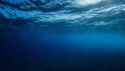 Dark blue ocean surface seen from underwater.