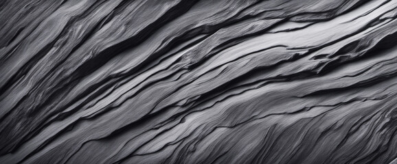 Black white rock surface texture. Close-up. Marble effect. Dark gray stone background with copy space for design. Wide banner. Panoramic.