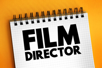 Film Director - make creative decisions to determine the look of a movie, text concept on notepad
