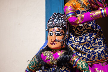 Indian colorful Rajasthani handmade Puppets and Crafts products at jodhpur. Selective focus.