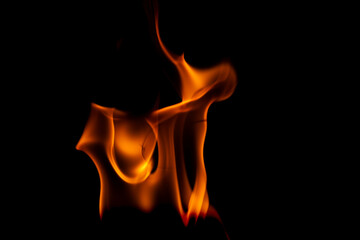Hot flames on a black background. Beautiful flame of fire in the dark. Abstract of burning flames...