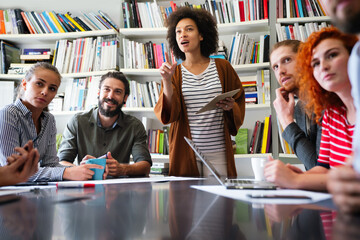 Group of young multiracial business people are working together in modern office. Freelancer concept