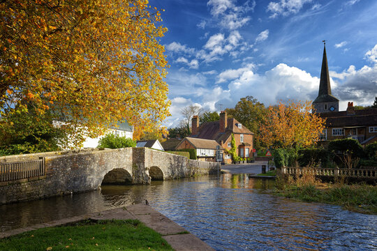 Eynsford a Village in Kent near Sevenoaks with a stone medieval bridge and Church and a ford through the shallow river for larger vehicles to cross.