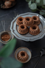 homemade chocolate cupcakes on a rustic plate