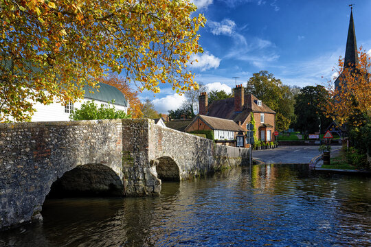 Eynsford a Village in Kent near Sevenoaks with a stone medieval bridge and Church and a ford through the shallow river for larger vehicles to cross.