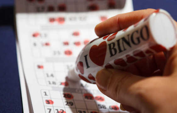 Birmingham, West Midlands, United Kingdom, 19th February 2018, hand marking bingo numbers on game book