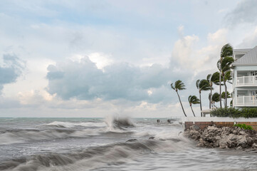 An angry ocean, lashing the shore of Key West, Florida, as it is glanced by a hurricane. 