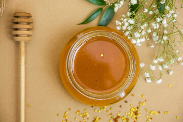 Honey in a jar, natural proteket. On a natural background - vintage. View from above.