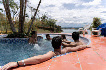 Friends Relaxing in Jacuzzi with Panoramic View