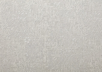 Background of gray wallpaper or plastered wall with a swirl pattern.