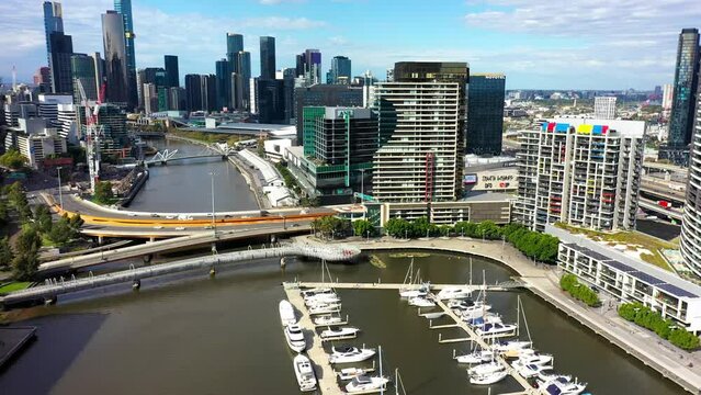 Drone footage of Yarra Edge Marina, where yachts are docked at this picturesque waterfront