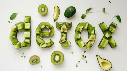 Poster word detox made from green avocado and kiwi on a white background, healthy eating, smoothie, food, fruit, tasty treat, healthy breakfast, weight loss, diet, nutrition © Julia Zarubina