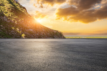 Asphalt road square and mountain with sky clouds landscape at sunset