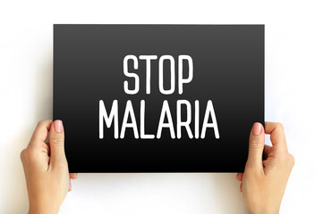 Stop Malaria text on card, medical concept background
