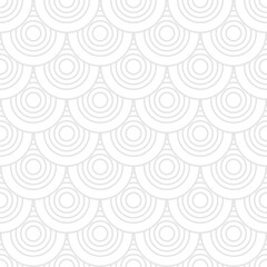 Seamless trendy pattern of circles and arcs, geometric white shapes for textiles and wallpaper. Festive Christmas pattern on a gray background.