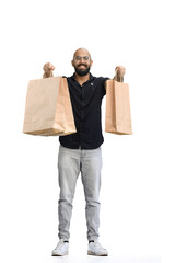 Man, on a white background, full-length, with bags