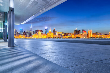 City Square floor and skyline with modern buildings landscape at night in Shanghai