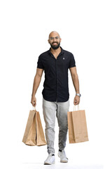 Man, on a white background, full-length, with bags