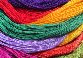 Different colorful embroidery threads