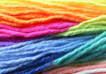 Different colorful embroidery threads