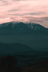 Vertical panorama of Pirin Mountain in Bulgaria from far away.