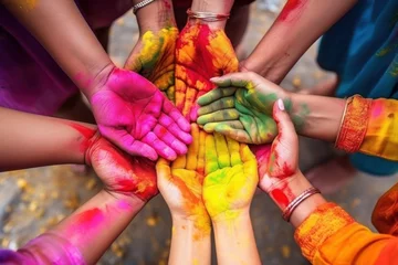 Gordijnen Holi festival in India - group of happy holi people showing colorful hands. Holi Celebration. Holi Concept. Indian Concept. © John Martin