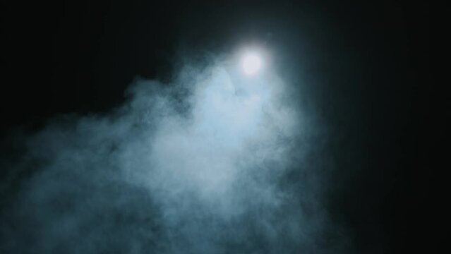 Footage of smoke foggy vaporiser whit white backlight background.