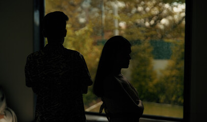 Indian Asian India stress upset tense young wife lies argue fight shout each other at dark indoor...