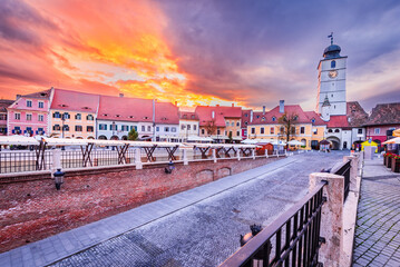 Sibiu, Romania. Lesser Square and Council Tower, Transylvania travel place. - obrazy, fototapety, plakaty