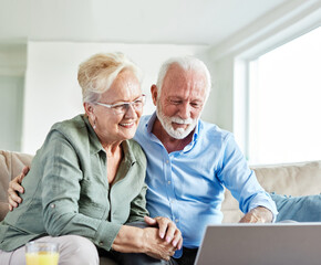 woman laptop man computer technology retirement senior adult couple home female wife husband...