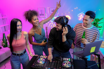 Group of friends having fun at a night party.